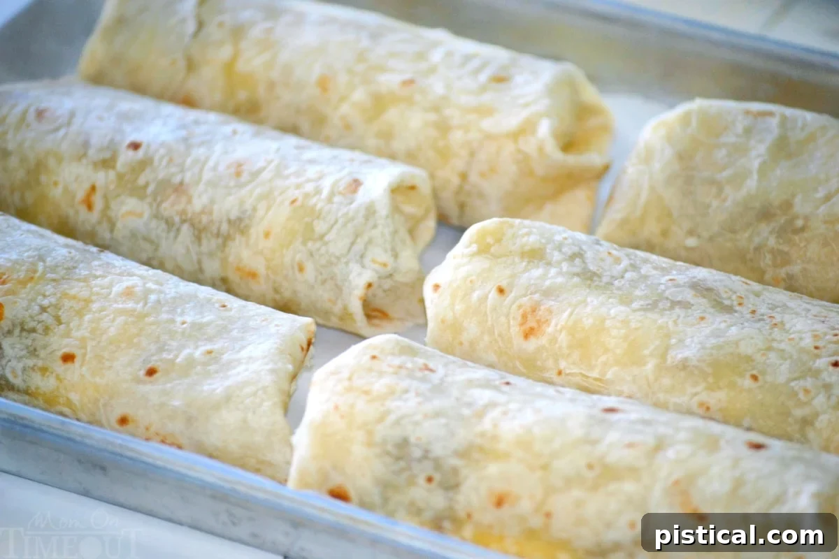 Ready When You Are Breakfast Burritos 10 six breakfast burritos on a baking sheet