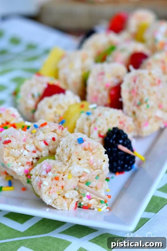 Close-up of Funfetti Rice Krispies Treats Fruit Kabobs with various fresh fruits