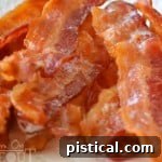 A small image showing perfectly cooked bacon.