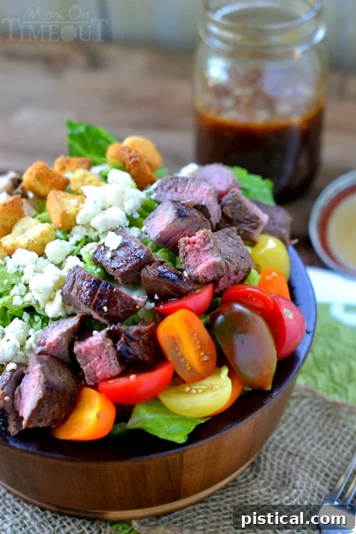 Close-up of grilled steak salad with balsamic honey vinaigrette