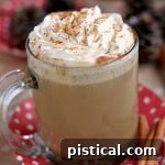 Slow Cooker Gingerbread Mocha served in a mug with whipped cream.