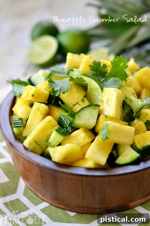This perfectly refreshing Pineapple Cucumber Salad is wonderfully easy to make and simply delicious! Great for summer BBQs, parties, potlucks and more! // Mom On Timeout