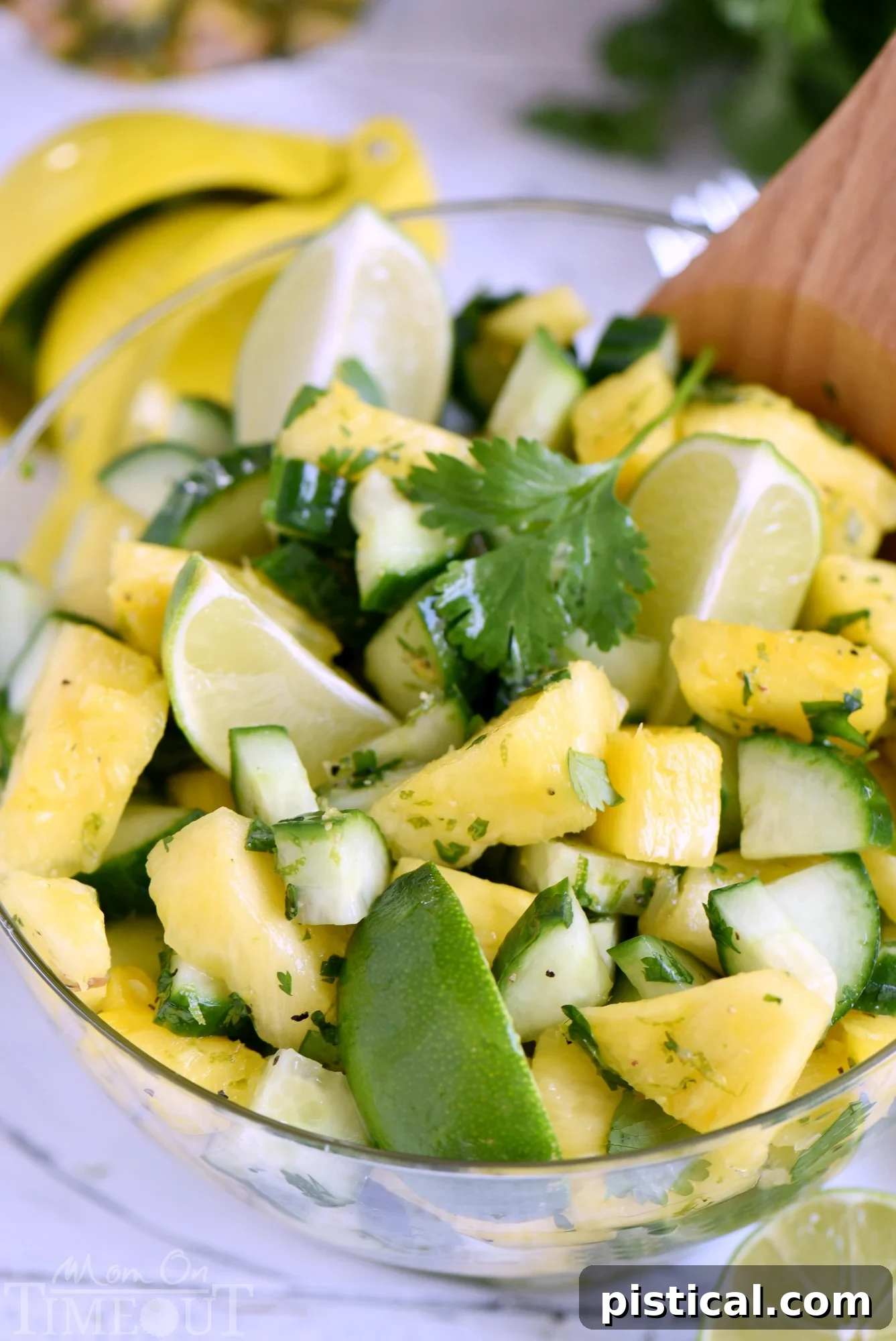 This perfectly refreshing Pineapple Cucumber Salad is wonderfully easy to make and simply delicious! Great for summer BBQs, parties, potlucks and more! // Mom On Timeout