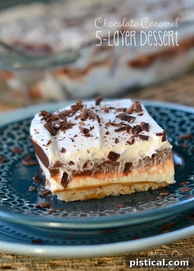 Golden Caramel Chocolate Dream 2 Indulge in the Layers of Perfection: Chocolate Caramel 5-Layer Dessert. A sweet shortbread crust, rich caramel, no-bake cheesecake, chocolate pudding, and whipped topping create an unforgettable dessert experience. | MomOnTimeout.com #dessert #recipe #chocolate #caramel #layereddessert