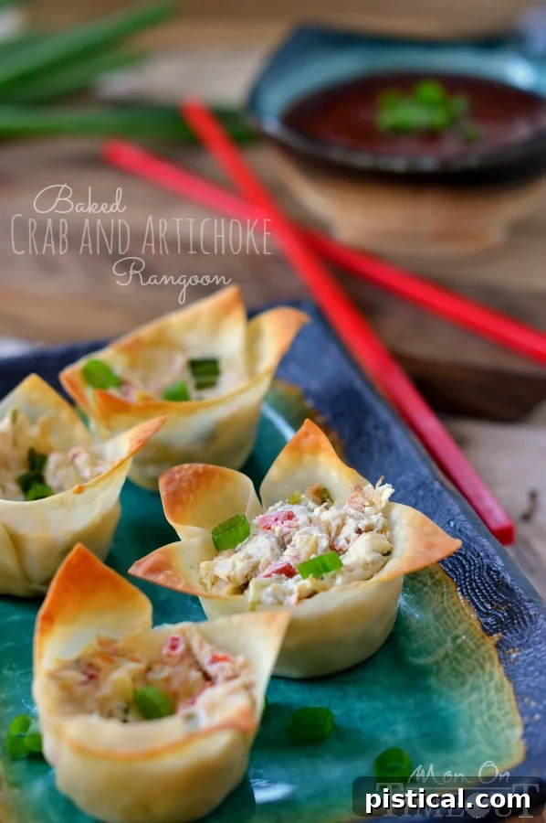 Baked Crab and Artichoke Rangoon made with cream cheese! | MomOnTimeout.com | #appetizer #recipe #crab