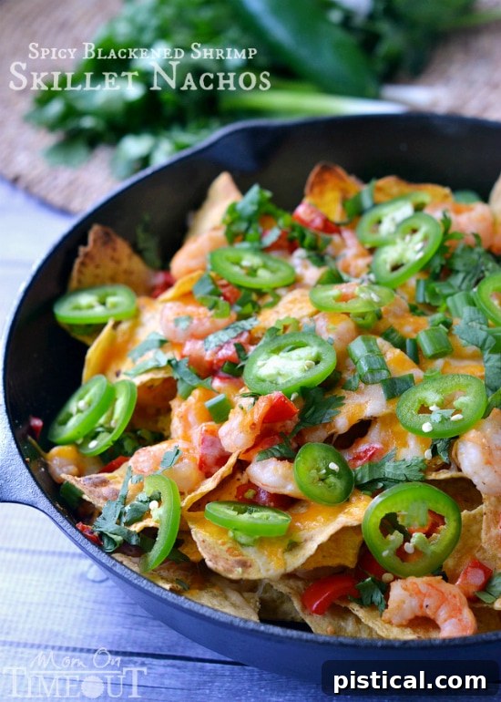 Spicy Blackened Shrimp Skillet Nachos recipe, perfect with creamy avocado buttermilk ranch dip. Delicious appetizer or meal idea. | MomOnTimeout.com