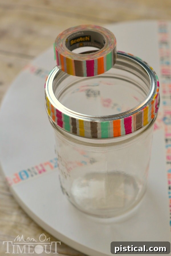 Revolving Homework Caddy 7 Decorating mason jar bands with various patterns of washi tape for a DIY homework station