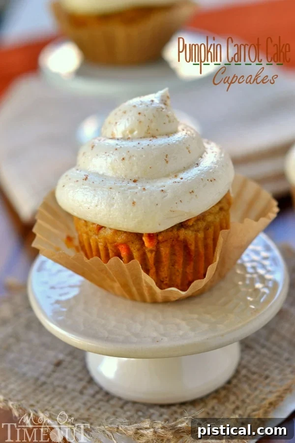 Pumpkin Carrot Cake Cupcakes with Maple Cream Cheese Frosting - the cupcakes you need to make this Fall! | MomOnTimeout.com | #dessert #recipe #pumpkin #maple #cupcakes