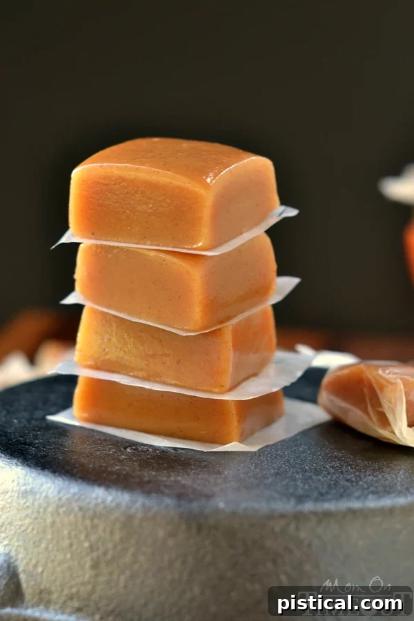 Close-up of freshly made Pumpkin Spice Caramels, showcasing their soft texture and rich color.