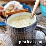 A delicious mug of Slow Cooker Spiced White Hot Chocolate, ready to warm you up.