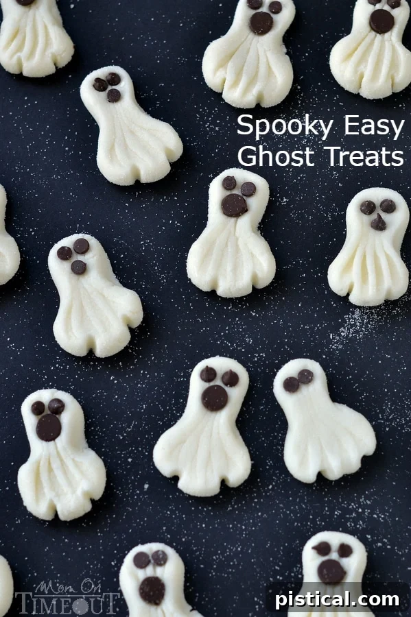 These Spooky Easy Ghost Treats are perfect for Halloween parties and simple enough for kids to help make. | MomOnTimeout.com | #halloween #candy #recipe #dessert #ghost