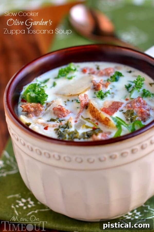 Get ready to please the whole family with this copycat Slow Cooker Olive Garden's Zuppa Toscana Soup! Comfort food at it's best! | MomOnTimeout.com | #recipe #soup #copycat #dinner