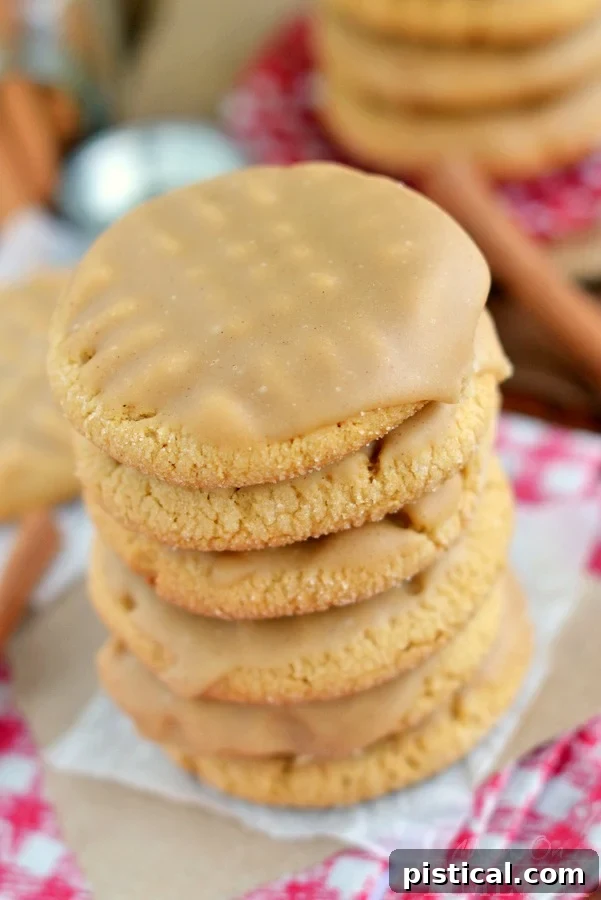 Indulge in the rich flavors of a Maple Cinnamon Glazed Peanut Butter Cookie Detailed close-up of a maple cinnamon glazed peanut butter cookie