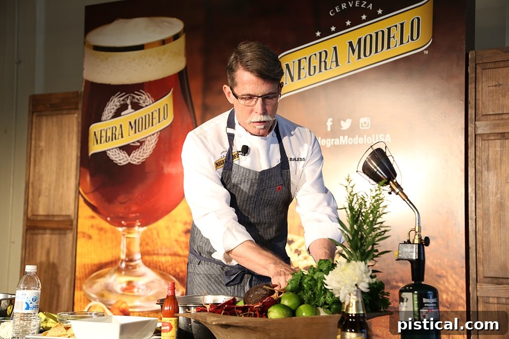 Chef Rick Bayless demonstrating culinary techniques with Negra Modelo beer, avocados, peppers, and onions.