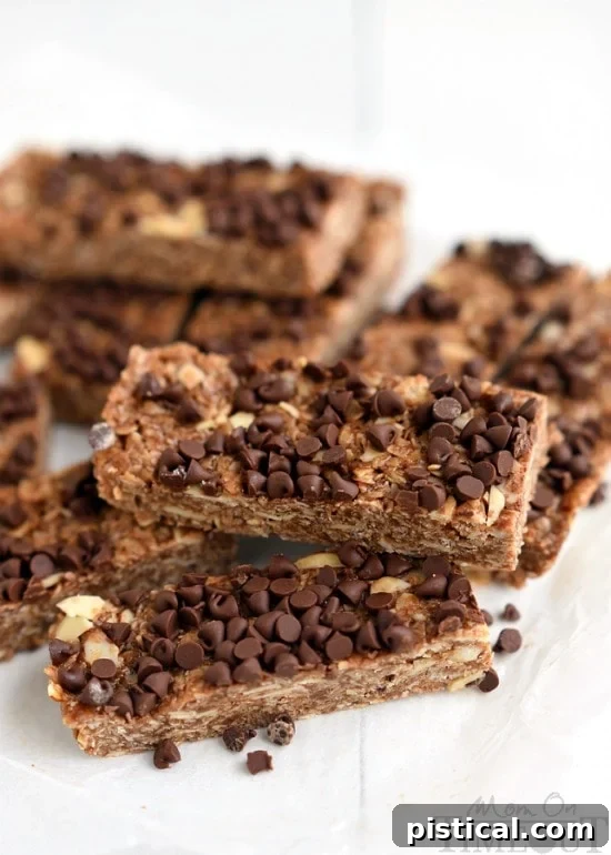Rich Mocha No-Bake Energy Bars 4 A stack of homemade Mocha No-Bake Granola Bars, cut into perfect rectangles and ready for serving. Showcases their wholesome ingredients and appealing texture for a healthy, energizing snack. | MomOnTimeout.com