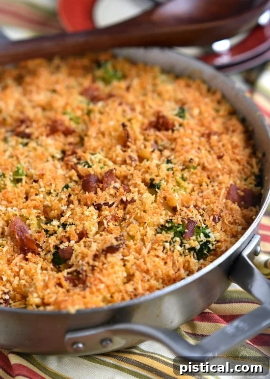 Skillet Bacon and Broccoli Macaroni and Cheese, topped with a golden panko-Parmesan crust.