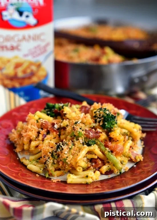 Serving of Skillet Bacon and Broccoli Macaroni and Cheese, ready to eat.