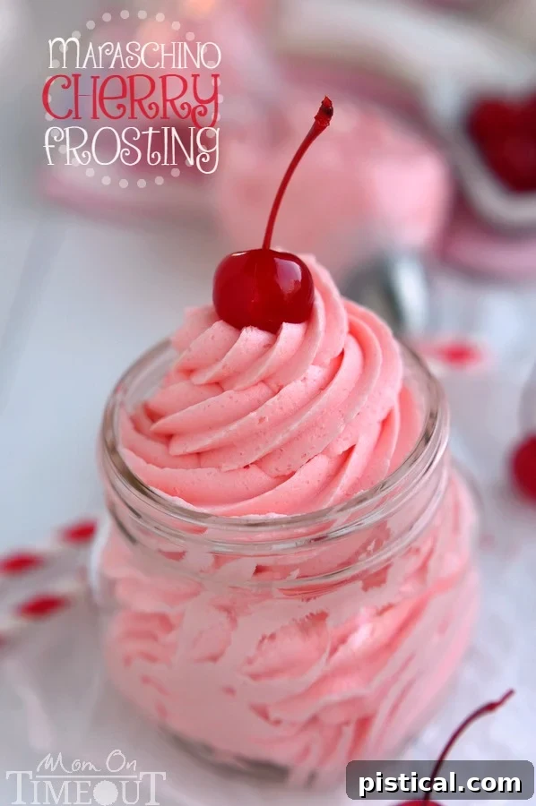 Vibrant Maraschino Cherry Frosting on a cupcake, showcasing its beautiful pink hue and smooth texture. A delicious way to use leftover cherry juice.