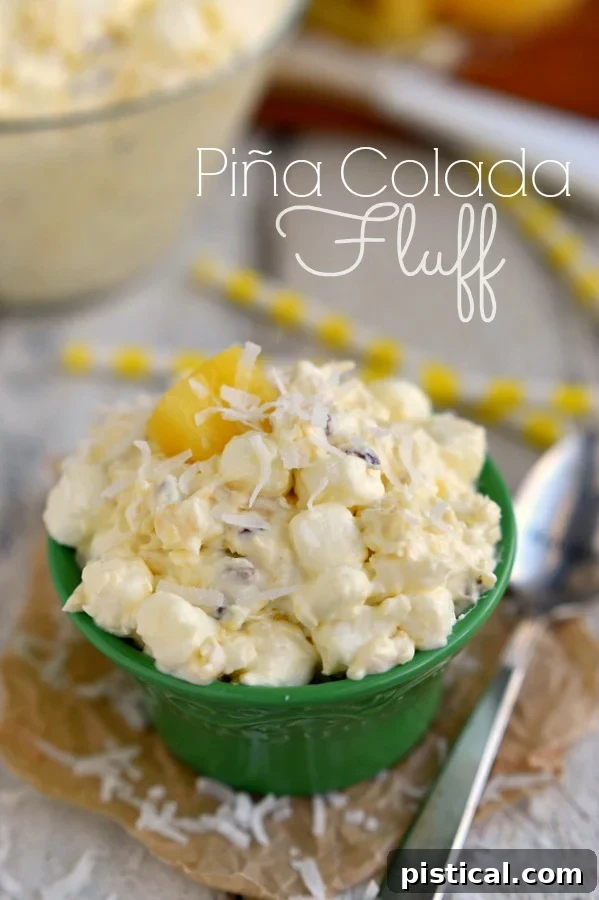 Pina Colada Cloud 3 Bring that tropical feeling home with Pina Colada Fluff! An incredibly easy and delicious dessert salad! MomOnTimeout.com | #recipe #salad #dessert #pineapple #coconut