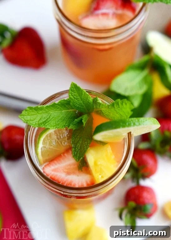 Perfectly cool, sweet, and SO refreshing, this fruit-infused cocktail has it all! | MomOnTimeout.com