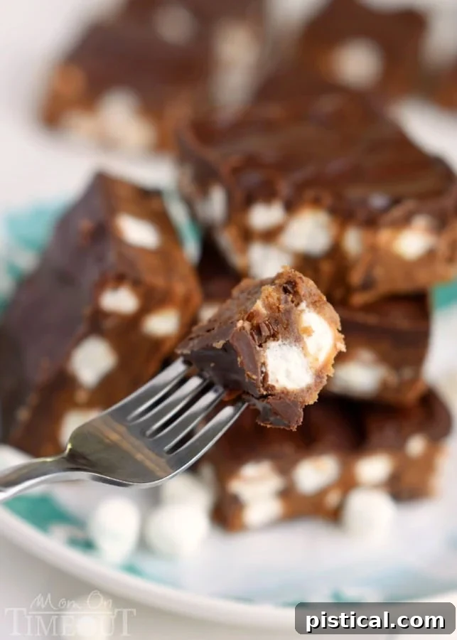 Decadent Peanut Butter S'mores No Bake Brownies can be whipped up in a jiffy and are just perfect for the hot summer months! This easy dessert recipe will having you coming back again and again. | MomOnTimeout.com