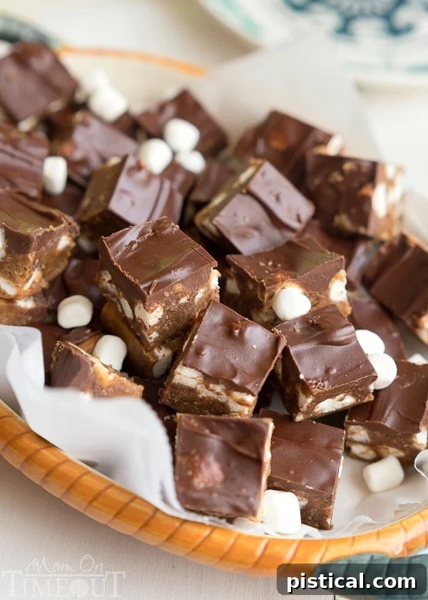 Decadent Peanut Butter S'mores No Bake Brownies can be whipped up in a jiffy and are just perfect for the hot summer months! This easy dessert recipe will having you coming back again and again. | MomOnTimeout.com