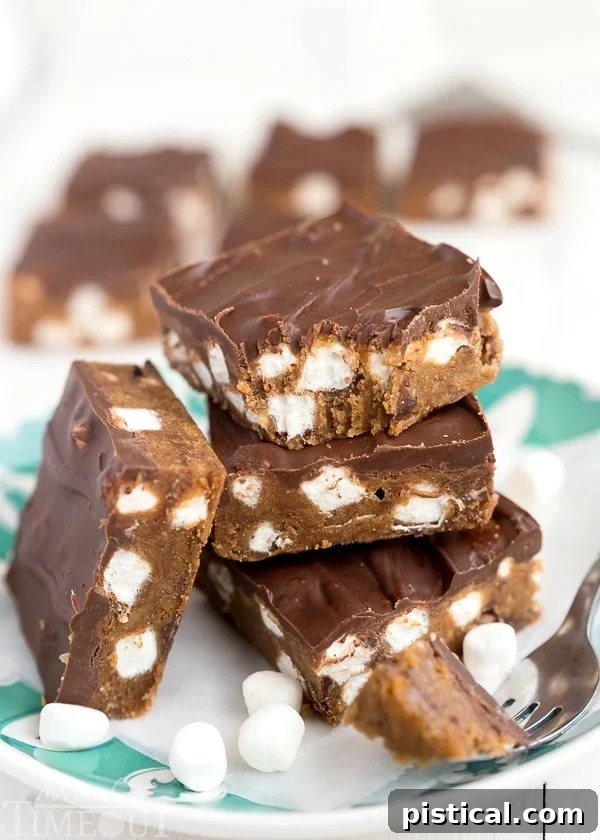 Decadent Peanut Butter S'mores No Bake Brownies can be whipped up in a jiffy and are just perfect for the hot summer months! This easy dessert recipe will having you coming back again and again. | MomOnTimeout.com