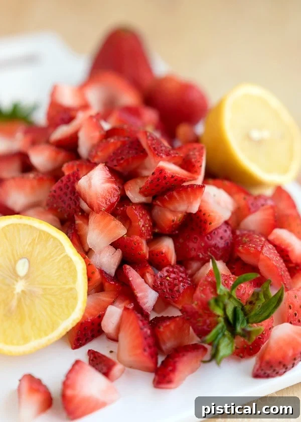 This Easy Homemade Strawberry Ice Cream Topping recipe is the perfect way to jazz up your ice cream tonight! Also the perfect topping for waffles, French toast, and so much more!