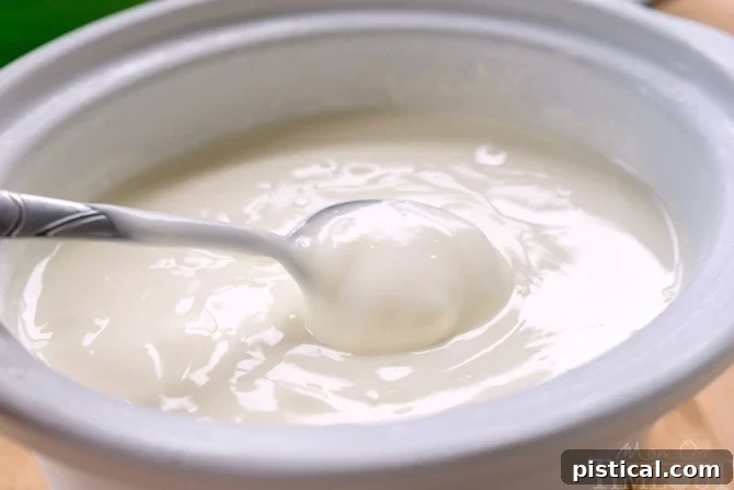 Slow cooker yogurt after overnight incubation, ready for the next step.