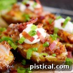 Fully Loaded Grilled BBQ Pork Potato Skins