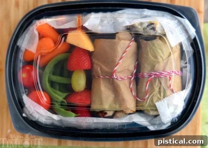 BLT Chicken Caesar Salad Wraps with various healthy snacks, showcasing ideal road trip food. Includes fresh fruit, vegetables, and the Perdue chicken wraps. | MomOnTimeout.com | #recipe #ad