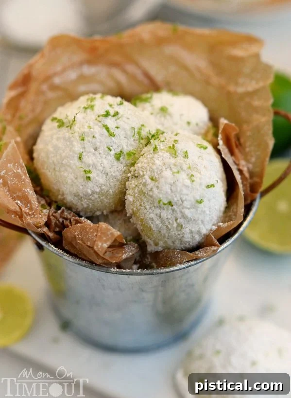 Tangy Key Lime Melt-Aways 3 Five key ingredients for Key Lime Snowball Cookies laid out: flour, cornstarch, butter, powdered sugar, and key limes.