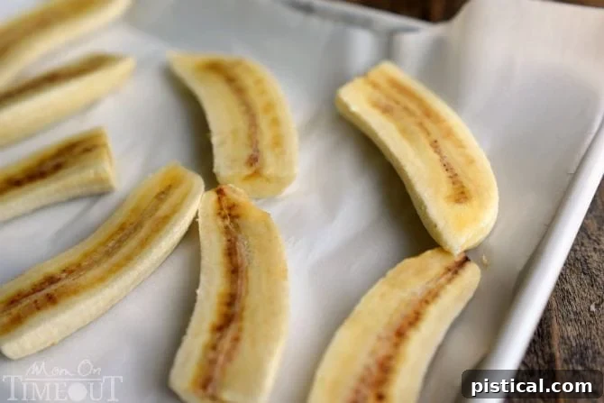 Close-up of frozen banana chunks, ready for blending into a delicious Bananas Foster Smoothie.