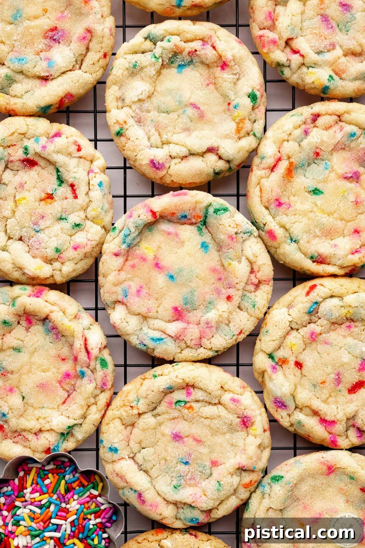 Funfetti cookies recipe baked and cooling on wire rack.